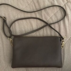Woman’s chocolate brown crossbody bad. Like new